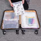 frosted, see-through storage bags from the set packed into an open suitcase