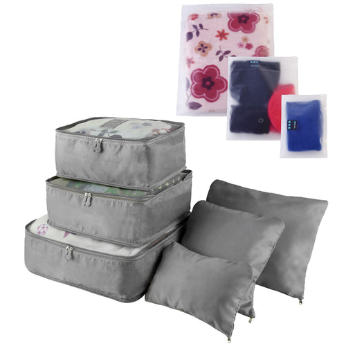 grey packing cubes and pouches with three frosted storage bags, nine pieces stacked on white